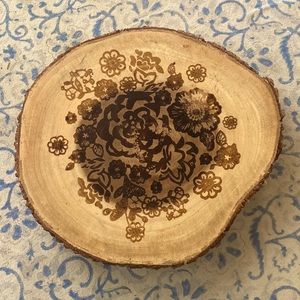 Studio California unique floral design wooden trivet.